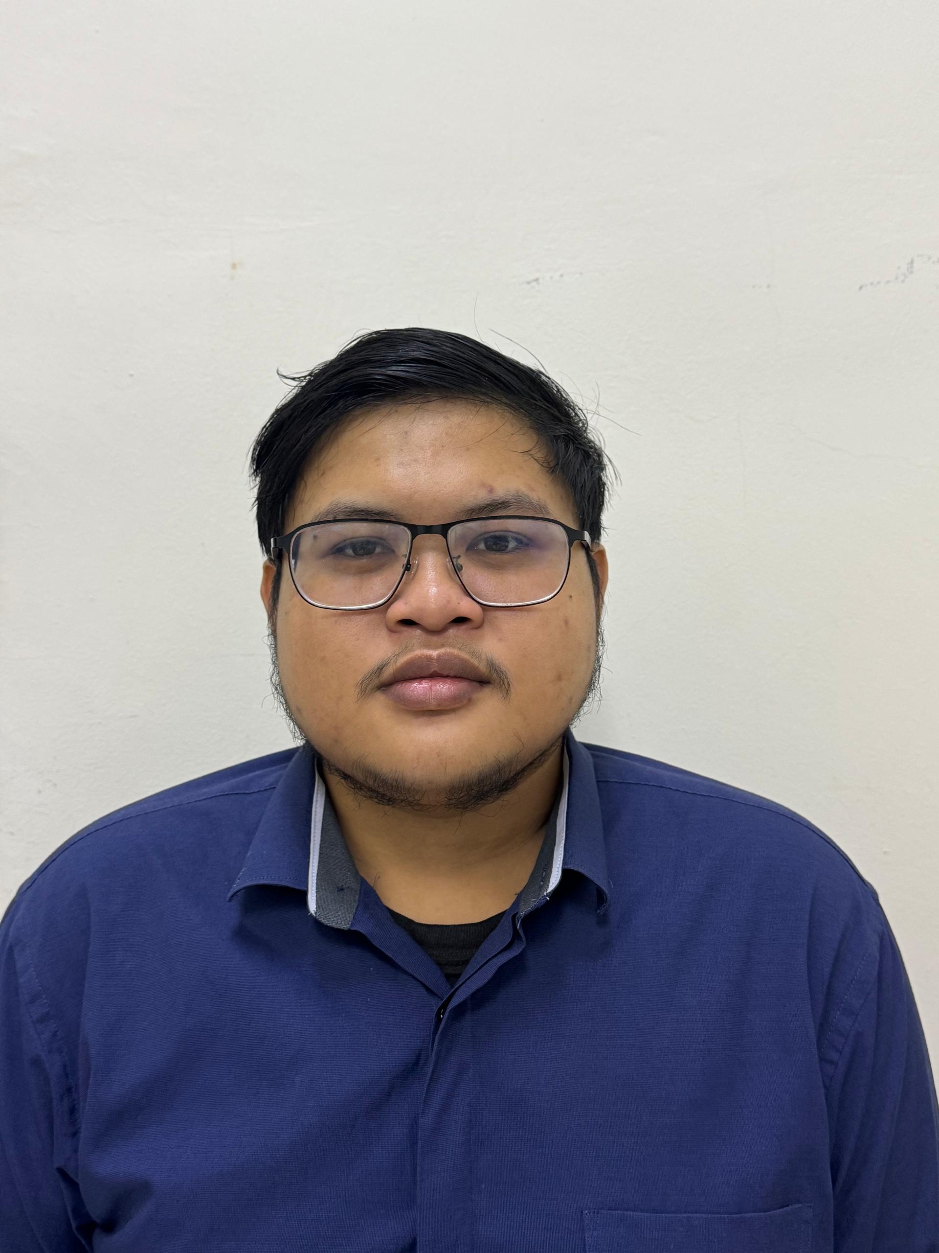 Encik Muhammad Akmal bin Mohd Abdul Basid